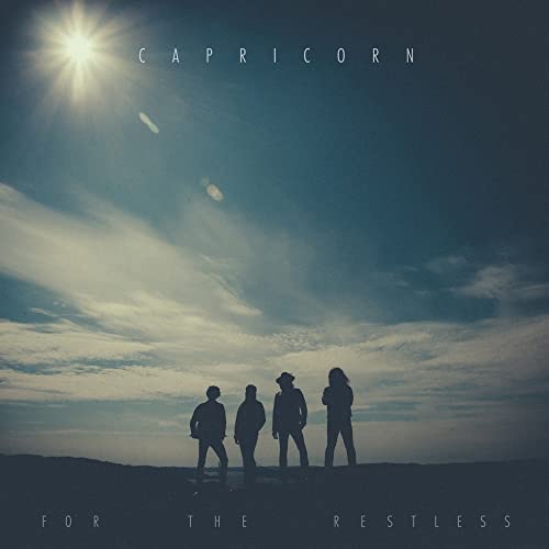 CD cover: silhouetted figures against a cloudy, nighttime sky.