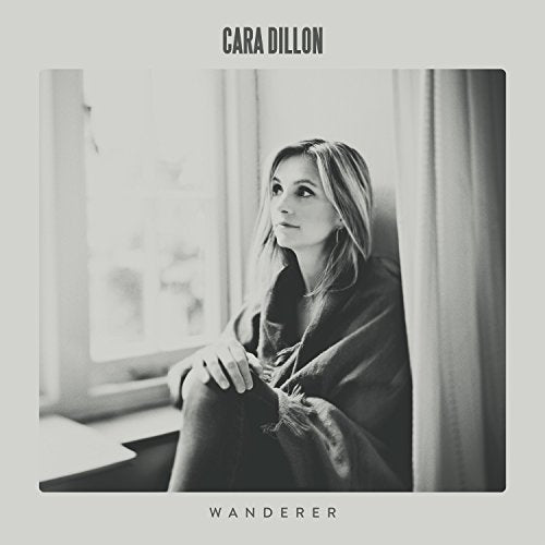 Black and white album cover for Cara Dillon’s “Wanderer,” featuring a woman by a window.