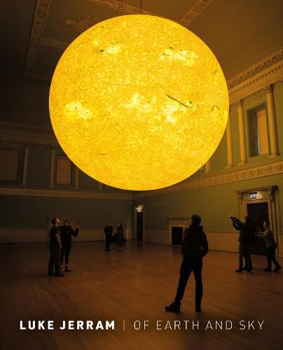Large illuminated sphere installation hangs in a grand, ornate hall.