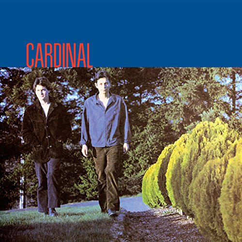 CD cover: two people walking on a path through greenery.