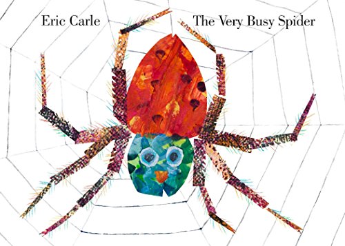 A colorful collage-style spider sits in the center of a white web.
