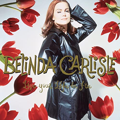 Belinda Carlisle album cover with red tulips and her in a leather coat.