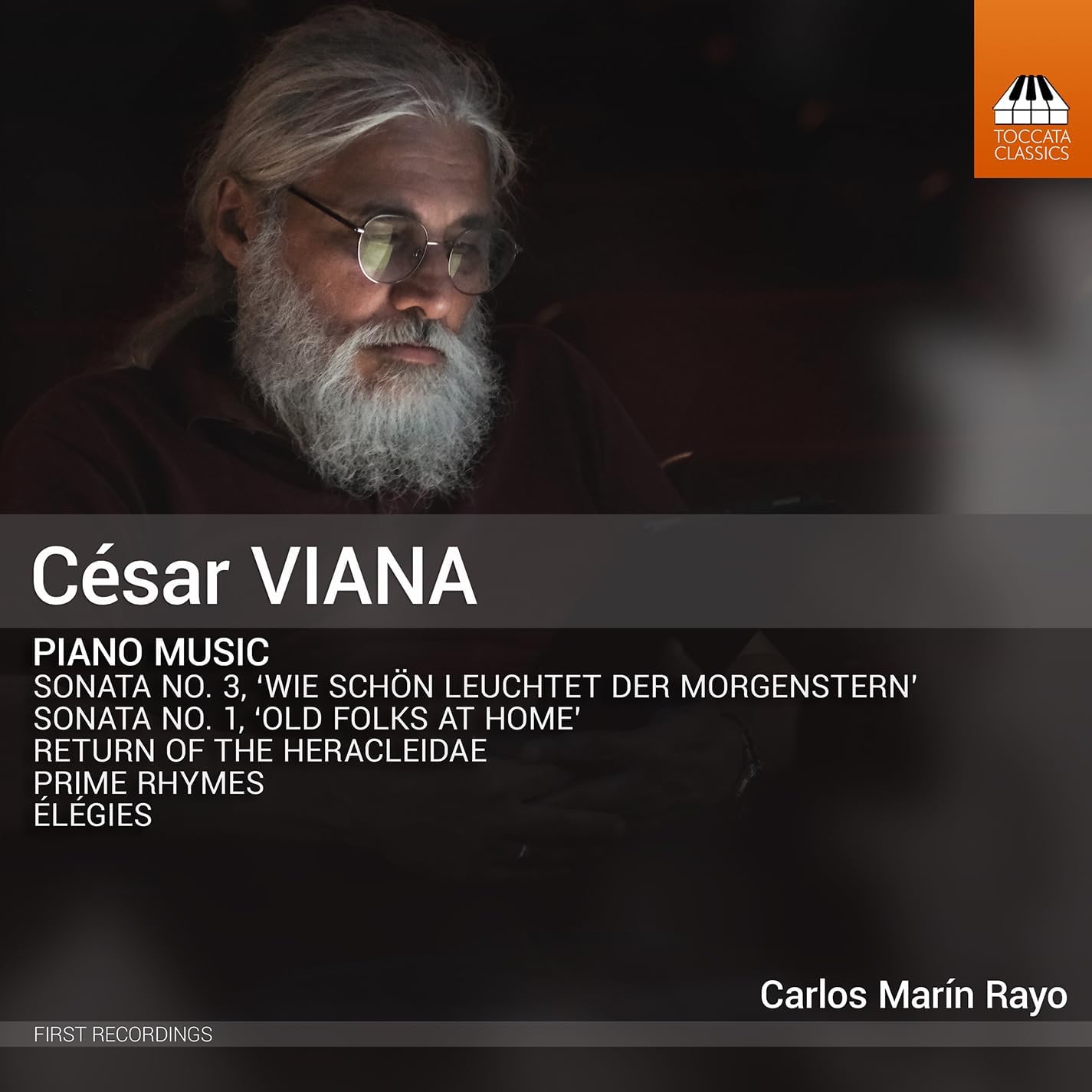 CD cover featuring a portrait of a bearded man with glasses.