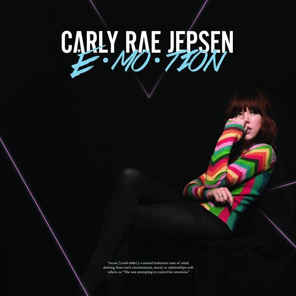 Carly Rae Jepsen’s “Emotion” album cover featuring her in a striped sweater.