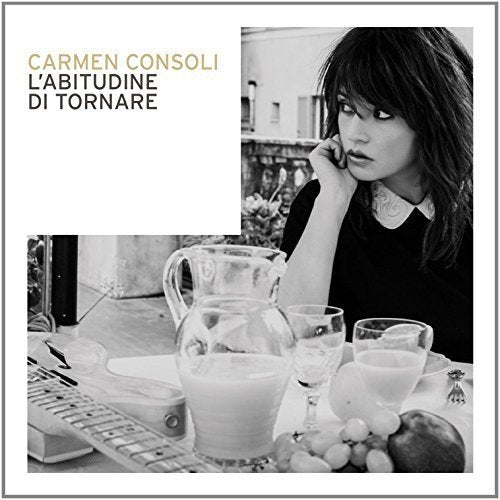 Black and white CD cover featuring Carmen Consoli and a still life.