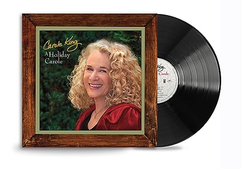 Carole King album cover and vinyl record against a white background.