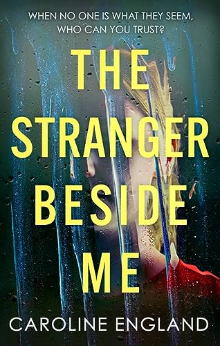 Book cover: woman’s face obscured by rain and blue streaks, yellow title.