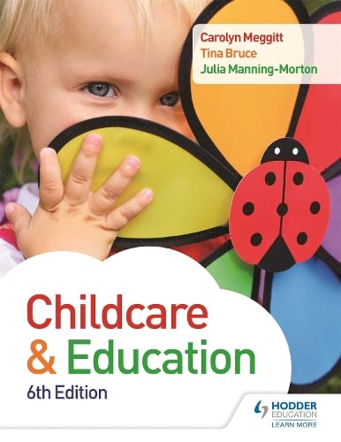 A young child holds a colorful flower toy with a ladybug on the cover.
