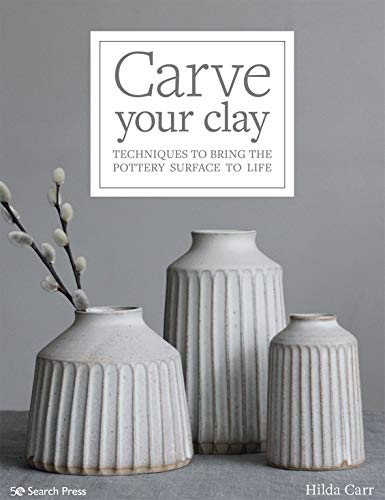 Book cover with textured pottery and a sprig of willow branches.