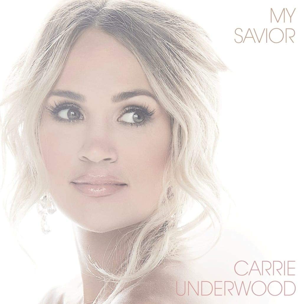 Carrie Underwood's album cover, "My Savior", featuring a blonde woman against a white background.