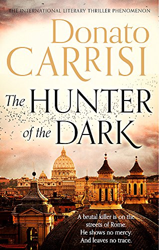 Book cover for The Hunter of the Dark featuring a sunset view of Rome.