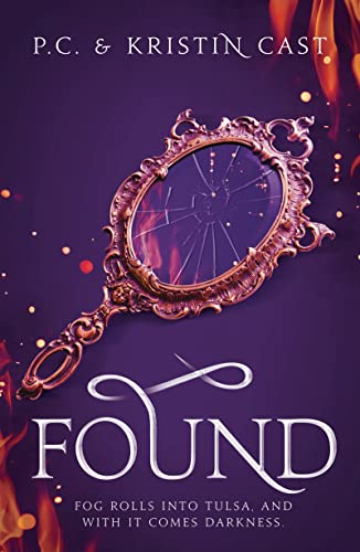 Book cover: ornate hand mirror with cracked glass and fiery background.