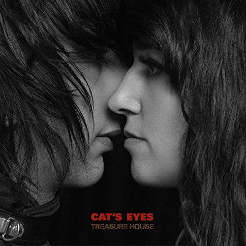 Black and white close-up of two people facing each other, album cover.
