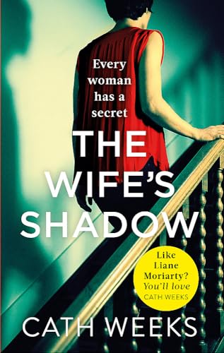 Book cover: woman on stairs, with a dark shadow and red dress.
