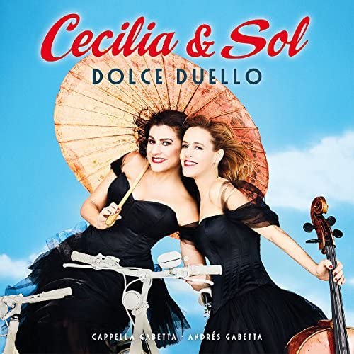 Two women and a cello under a large parasol, album cover.