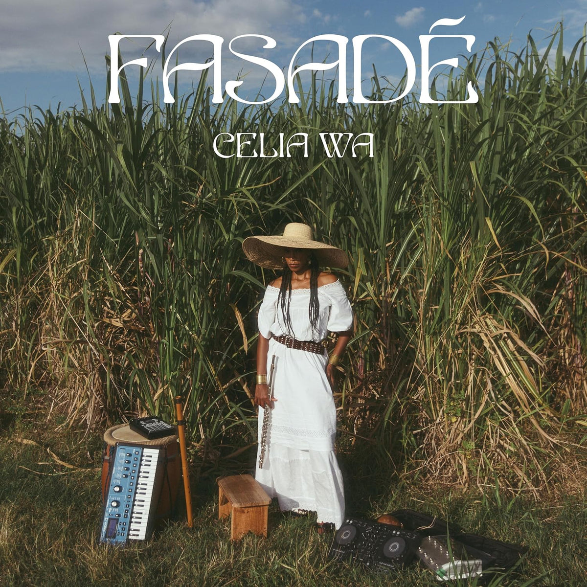 CD cover for Celia Wa’s “Fasade” featuring a woman in a field.