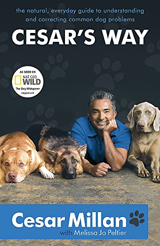 Book cover featuring Cesar Millan with three dogs, titled "Cesar's Way".