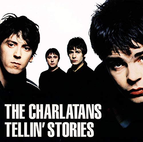 CD cover for The Charlatansā āTellinā Storiesā featuring four band members.