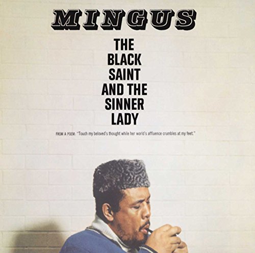 Charles Mingus album cover: black background with white text and a portrait.