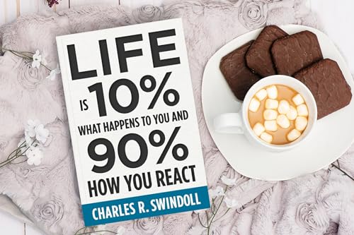 Book cover with large text and a cup of coffee with marshmallows.