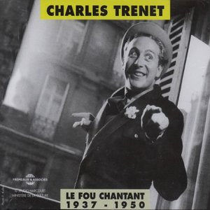 Charles Trenet in a hat pointing, album cover for “Le Fou Chantant.”