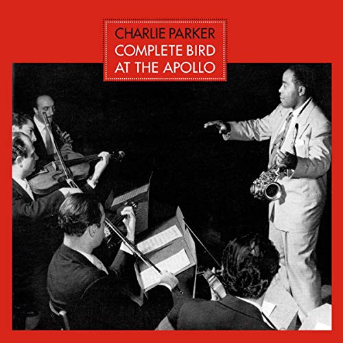 Charlie Parker playing saxophone with an orchestra, album cover.
