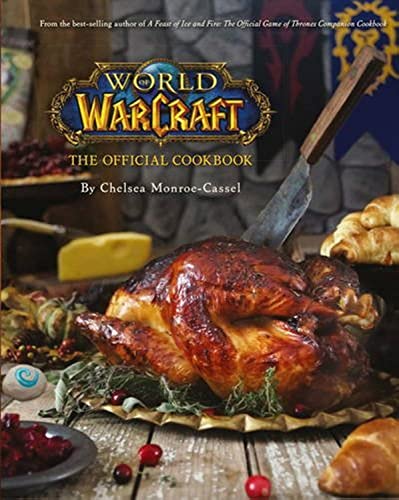 “World of Warcraft” cookbook with roasted turkey and fresh produce displayed.
