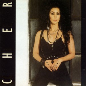 Cher album cover, "Heart of Stone," featuring a portrait of the singer.