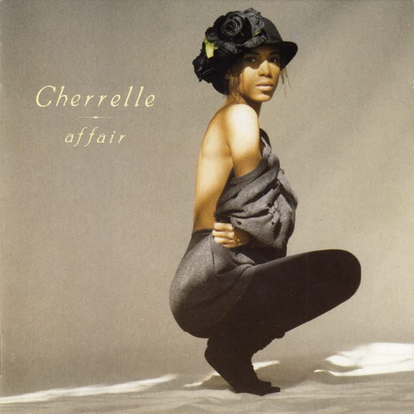 Cherrelle album cover, "Affair", featuring a woman in a hat and draped fabric.