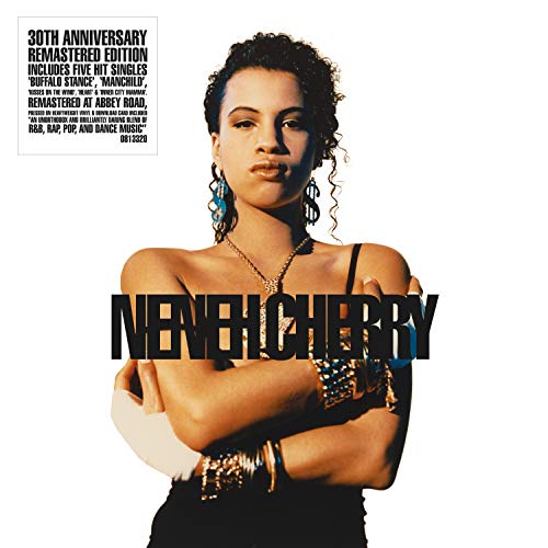Vinyl record sleeve with a woman's portrait and black vinyl partially visible.