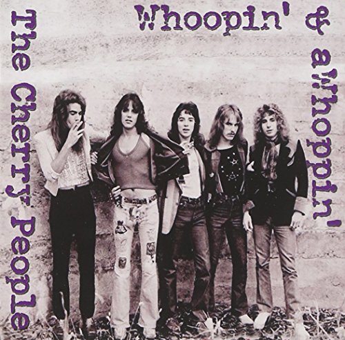 1980s rock band portrait, purple text, album cover for "Whoopin' & A Whoppin'".