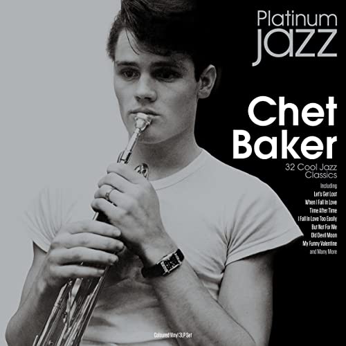 Black and white portrait of Chet Baker holding a trumpet, album cover.