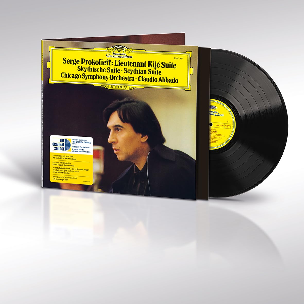 Vinyl record cover featuring Claudio Abbado and a black vinyl disc on white background.