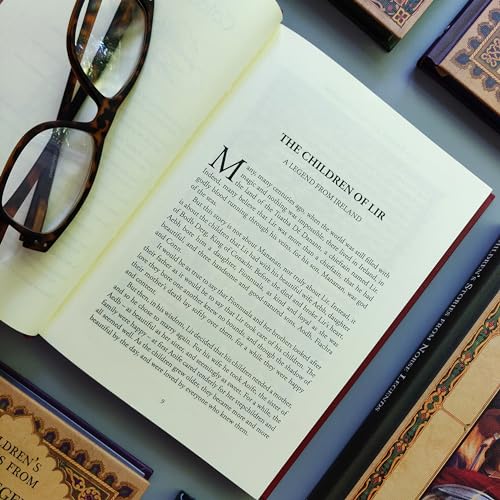Open book of “Children’s Stories from Old British and Irish Legends” with glasses.