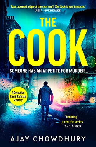 Book cover: “The Cook” with a man standing in a rainy city street.
