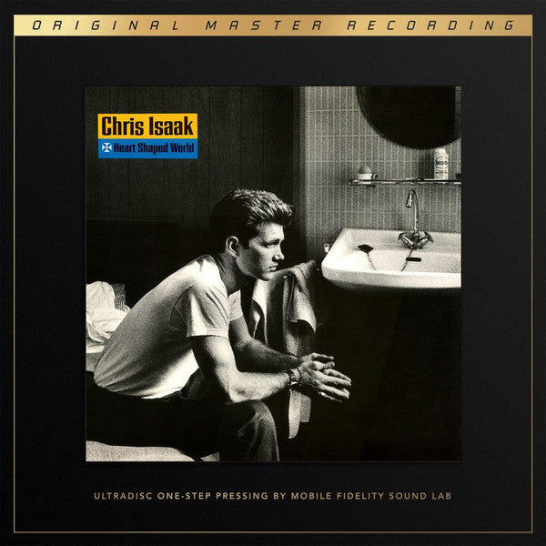 Chris Isaak album cover: black and white photo of a man in a bathroom.