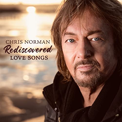 CD cover featuring Chris Norman’s portrait with “Rediscovered Love Songs” text.
