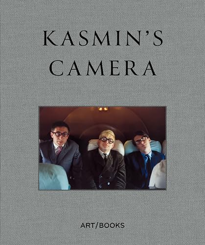 Book cover: "Kasmin's Camera" with a photo of three men in suits.