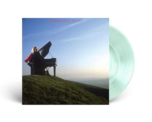Christine McVie album cover with a woman at a piano and vinyl record.