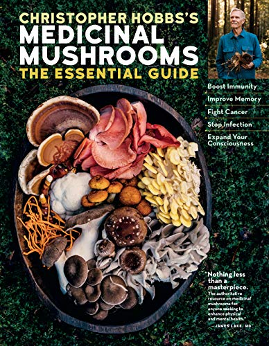 Book cover showing a bowl of various mushrooms with the author in the background.