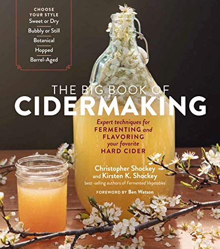 Book cover featuring a glass jug of cider with apple blossoms.