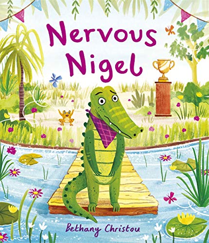 Green crocodile, “Nervous Nigel”, stands on a dock with a small orange cat.
