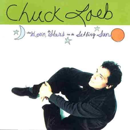 Chuck Loeb album cover with a man sitting, holding his leg, on a white background.