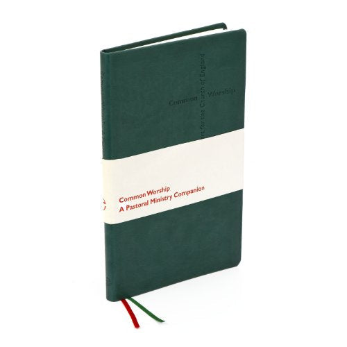 Dark green book, "Common Worship: Pastoral Ministry Companion," with ribbon markers.