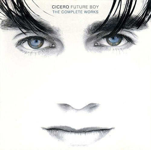 "Album cover featuring a close-up of a face with blue eyes and black eyelashes."