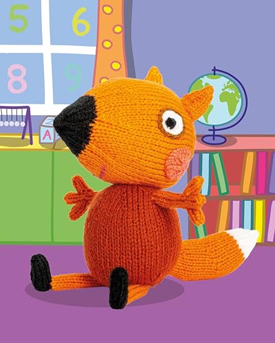 A knitted orange fox toy sitting in a colorful cartoon classroom setting.