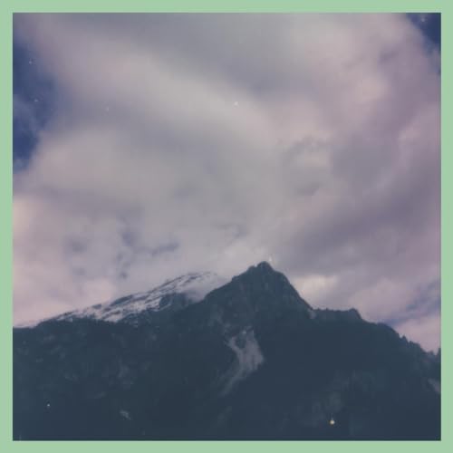 CD cover with a snowy mountain peak under cloudy, purple skies.