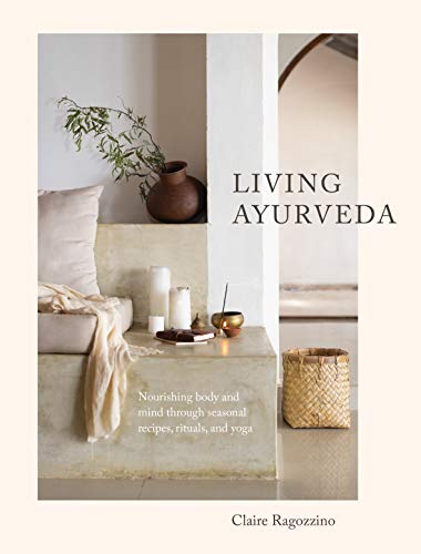 Book cover with text “Living Ayurveda” and a neutral-toned interior scene.