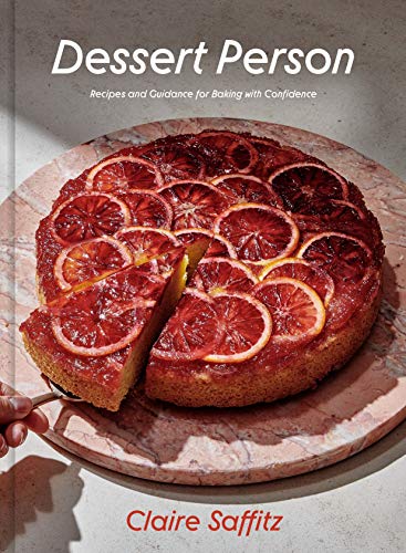Cookbook cover featuring a blood orange upside-down cake on a marble serving board.