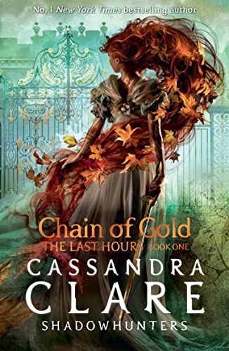 Book cover: woman in gown, falling leaves, ornate gate, gold lettering.